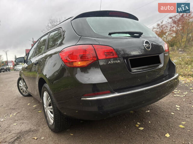 Черный Опель Астра, объемом двигателя 1.6 л и пробегом 205 тыс. км за 8290 $, фото 5 на Automoto.ua