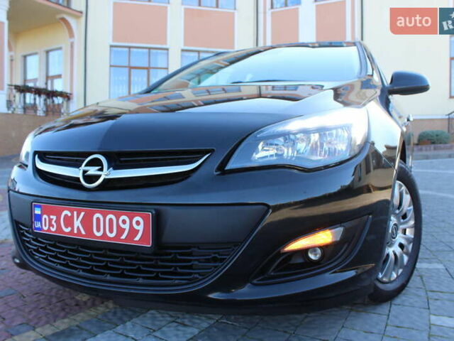 Черный Опель Астра, объемом двигателя 1.6 л и пробегом 205 тыс. км за 7790 $, фото 1 на Automoto.ua