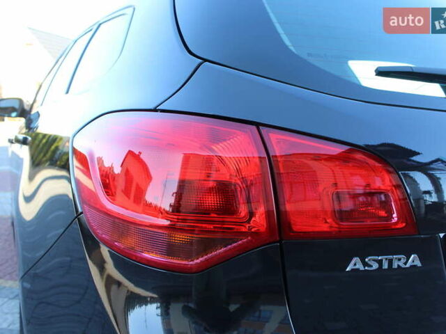 Черный Опель Астра, объемом двигателя 1.6 л и пробегом 205 тыс. км за 7790 $, фото 26 на Automoto.ua