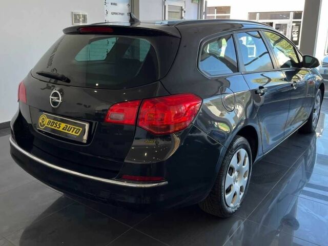 Черный Опель Астра, объемом двигателя 1.6 л и пробегом 291 тыс. км за 8200 $, фото 6 на Automoto.ua