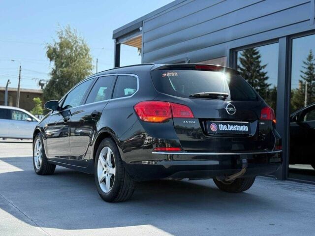 Черный Опель Астра, объемом двигателя 1.6 л и пробегом 216 тыс. км за 7800 $, фото 5 на Automoto.ua