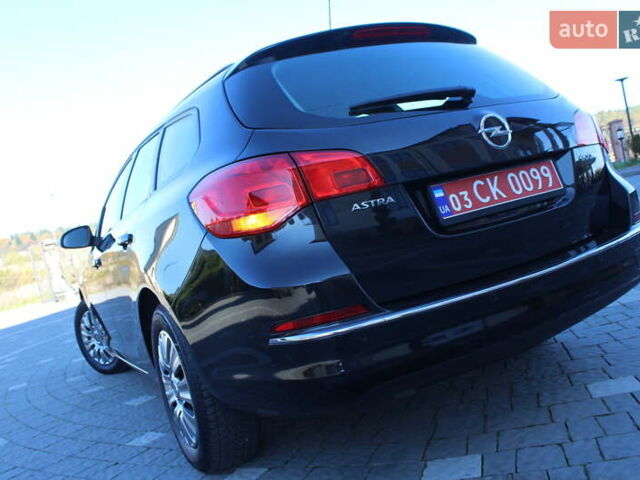 Чорний Опель Астра, об'ємом двигуна 1.6 л та пробігом 205 тис. км за 8390 $, фото 9 на Automoto.ua