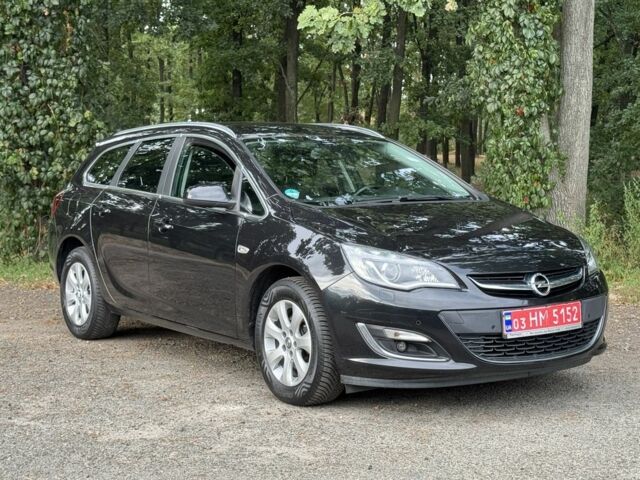 Черный Опель Астра, объемом двигателя 1.6 л и пробегом 156 тыс. км за 9300 $, фото 1 на Automoto.ua