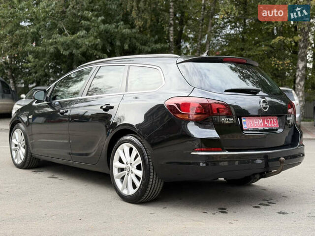 Черный Опель Астра, объемом двигателя 1.6 л и пробегом 243 тыс. км за 10350 $, фото 7 на Automoto.ua