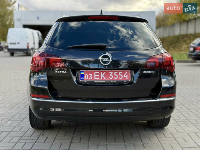 Черный Опель Астра, объемом двигателя 1.6 л и пробегом 220 тыс. км за 9900 $, фото 9 на Automoto.ua