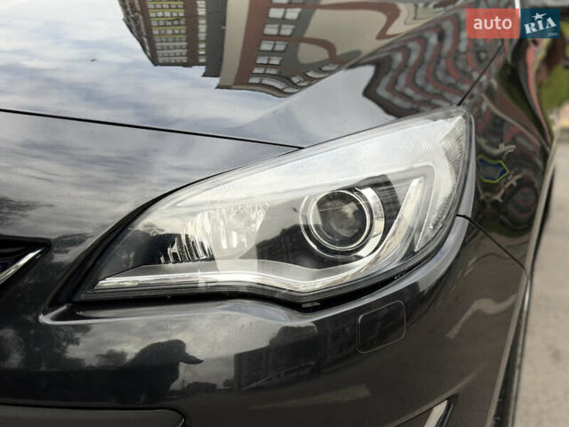 Черный Опель Астра, объемом двигателя 1.6 л и пробегом 243 тыс. км за 10350 $, фото 13 на Automoto.ua