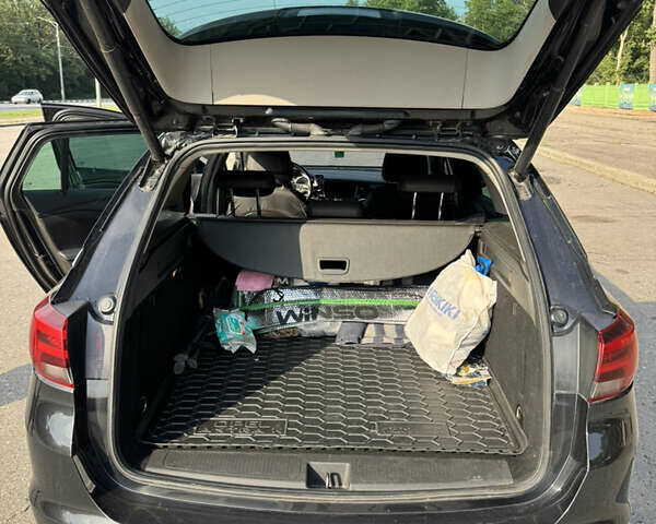 Черный Опель Астра, объемом двигателя 1.6 л и пробегом 307 тыс. км за 9600 $, фото 6 на Automoto.ua