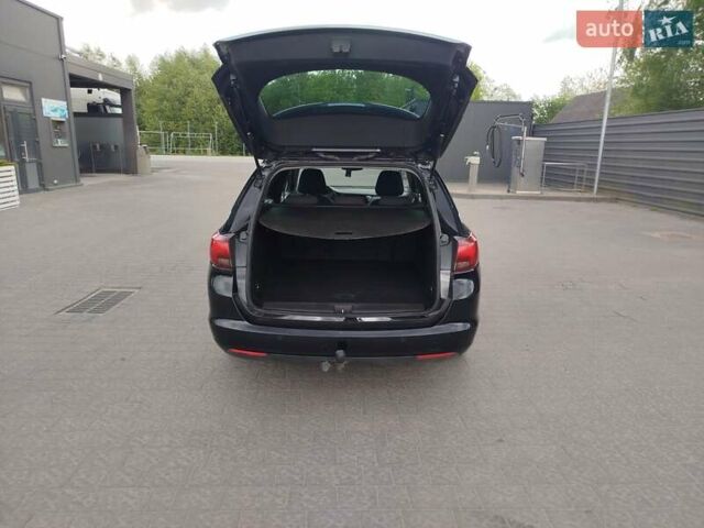 Черный Опель Астра, объемом двигателя 1.6 л и пробегом 247 тыс. км за 9550 $, фото 8 на Automoto.ua