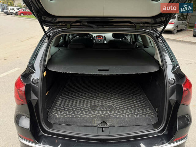 Черный Опель Астра, объемом двигателя 1.6 л и пробегом 243 тыс. км за 10350 $, фото 44 на Automoto.ua