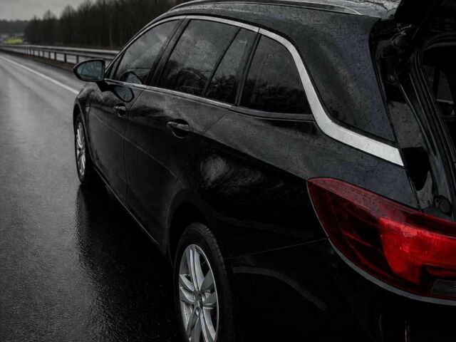 Чорний Опель Астра, об'ємом двигуна 0 л та пробігом 218 тис. км за 9550 $, фото 4 на Automoto.ua
