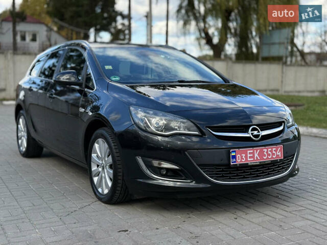 Черный Опель Астра, объемом двигателя 1.6 л и пробегом 220 тыс. км за 9900 $, фото 1 на Automoto.ua