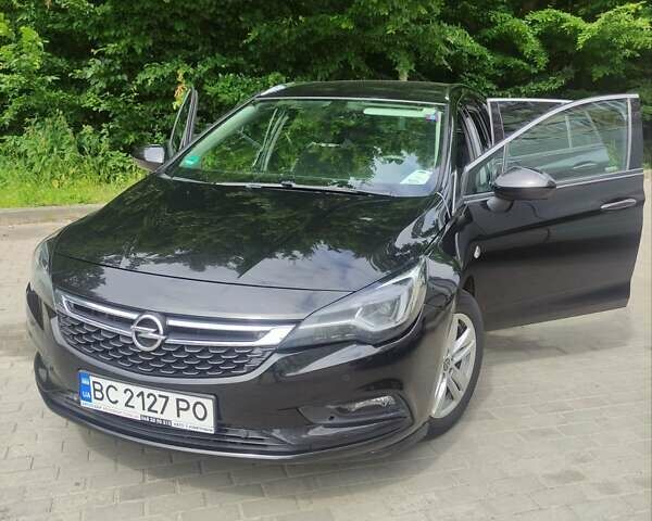 Черный Опель Астра, объемом двигателя 1.6 л и пробегом 295 тыс. км за 11400 $, фото 2 на Automoto.ua