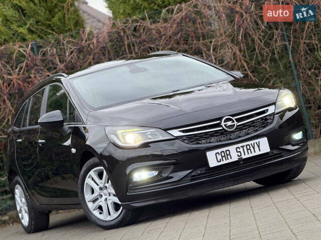 Чорний Опель Астра, об'ємом двигуна 1.6 л та пробігом 196 тис. км за 10999 $, фото 7 на Automoto.ua
