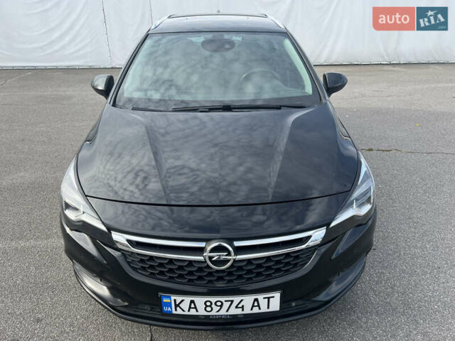 Черный Опель Астра, объемом двигателя 1.6 л и пробегом 224 тыс. км за 12000 $, фото 3 на Automoto.ua