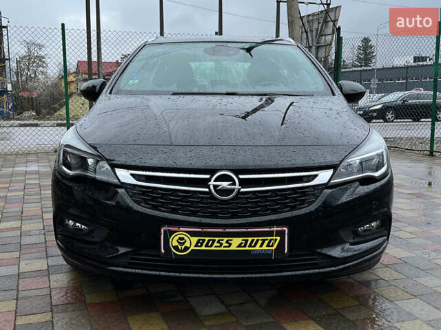 Черный Опель Астра, объемом двигателя 1.6 л и пробегом 199 тыс. км за 11700 $, фото 1 на Automoto.ua