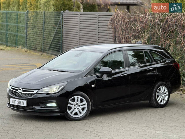 Чорний Опель Астра, об'ємом двигуна 1.6 л та пробігом 196 тис. км за 10999 $, фото 7 на Automoto.ua