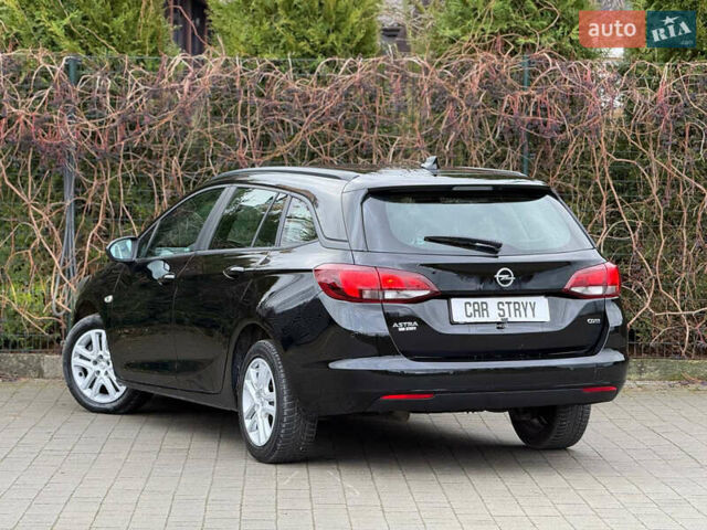 Чорний Опель Астра, об'ємом двигуна 1.6 л та пробігом 196 тис. км за 10999 $, фото 2 на Automoto.ua