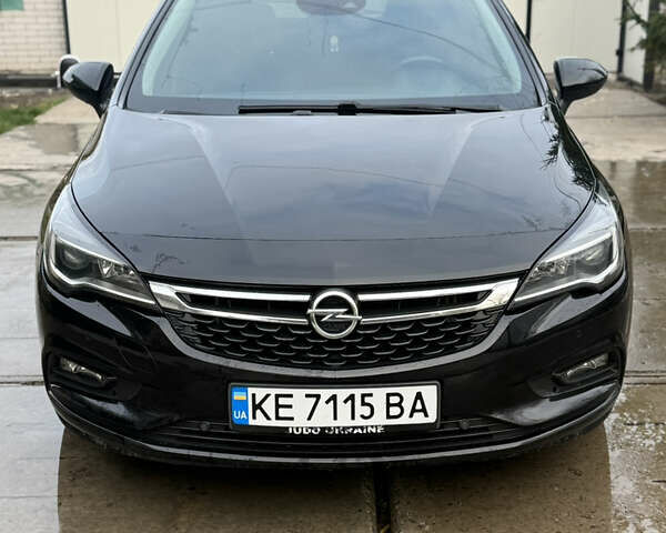 Черный Опель Астра, объемом двигателя 1.6 л и пробегом 173 тыс. км за 12000 $, фото 1 на Automoto.ua