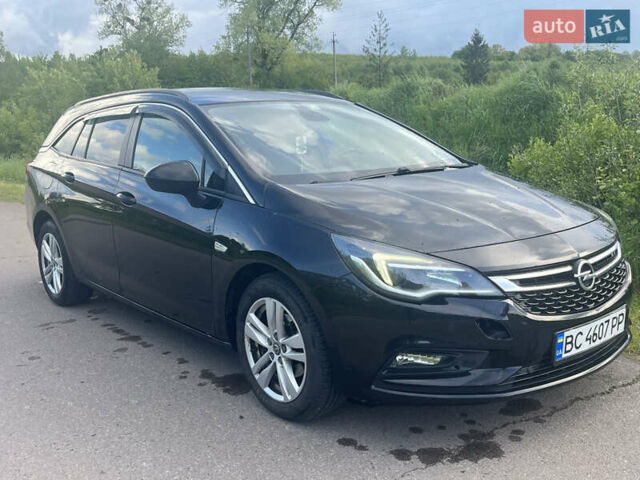 Черный Опель Астра, объемом двигателя 1.6 л и пробегом 242 тыс. км за 8400 $, фото 4 на Automoto.ua