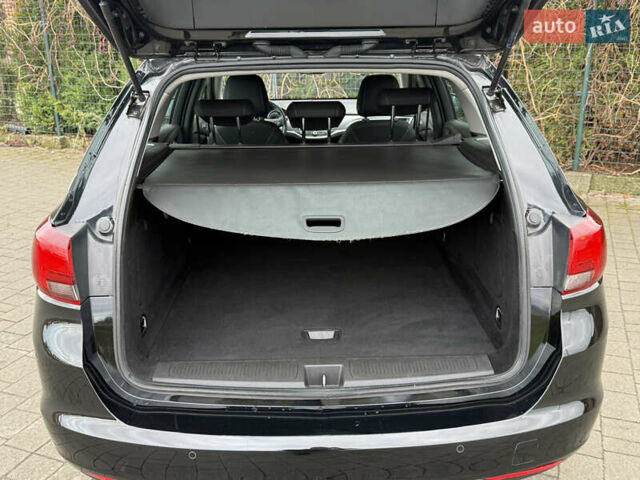 Чорний Опель Астра, об'ємом двигуна 1.6 л та пробігом 196 тис. км за 10999 $, фото 36 на Automoto.ua