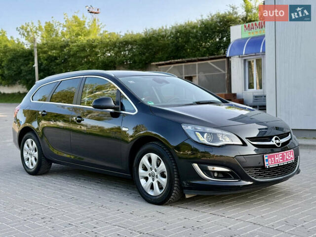 Черный Опель Астра, объемом двигателя 1.6 л и пробегом 225 тыс. км за 9800 $, фото 1 на Automoto.ua