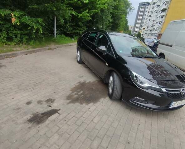 Черный Опель Астра, объемом двигателя 1.6 л и пробегом 295 тыс. км за 11400 $, фото 1 на Automoto.ua