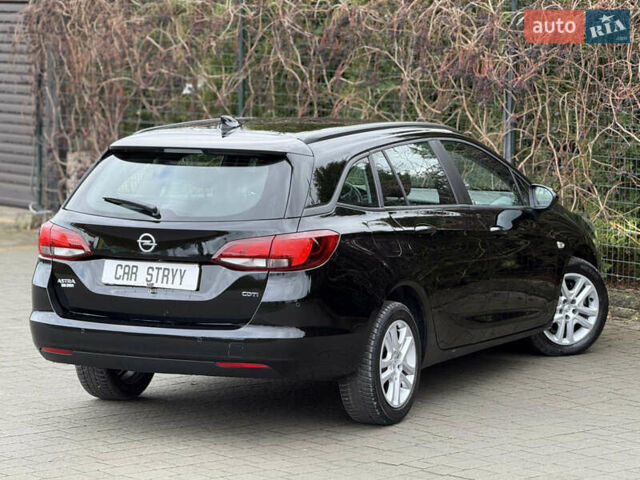 Чорний Опель Астра, об'ємом двигуна 1.6 л та пробігом 196 тис. км за 10999 $, фото 2 на Automoto.ua