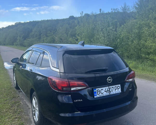 Черный Опель Астра, объемом двигателя 1.6 л и пробегом 242 тыс. км за 8400 $, фото 3 на Automoto.ua