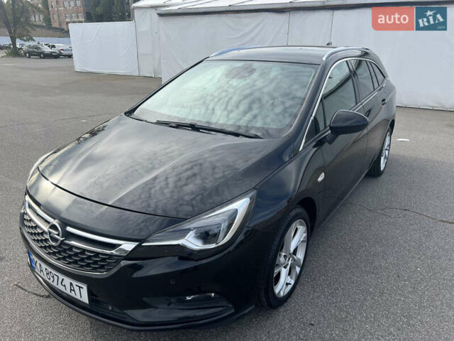 Черный Опель Астра, объемом двигателя 1.6 л и пробегом 224 тыс. км за 12000 $, фото 1 на Automoto.ua