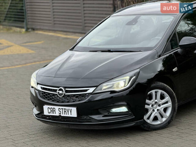 Чорний Опель Астра, об'ємом двигуна 1.6 л та пробігом 196 тис. км за 10999 $, фото 9 на Automoto.ua