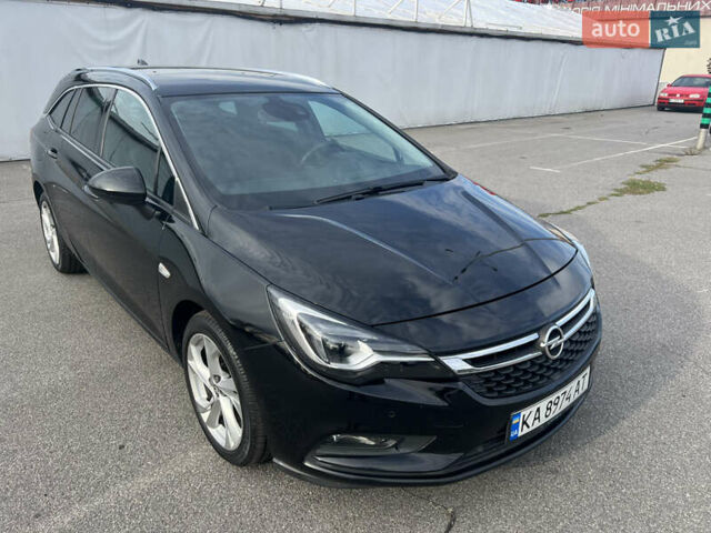 Черный Опель Астра, объемом двигателя 1.6 л и пробегом 224 тыс. км за 12000 $, фото 4 на Automoto.ua