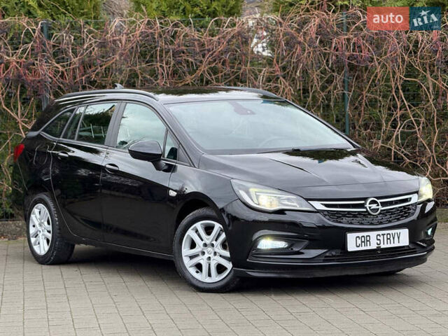 Чорний Опель Астра, об'ємом двигуна 1.6 л та пробігом 196 тис. км за 10999 $, фото 6 на Automoto.ua