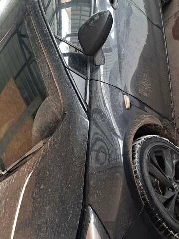 Черный Опель Астра, объемом двигателя 1.6 л и пробегом 196 тыс. км за 9000 $, фото 2 на Automoto.ua