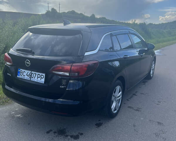 Черный Опель Астра, объемом двигателя 1.6 л и пробегом 242 тыс. км за 8400 $, фото 1 на Automoto.ua