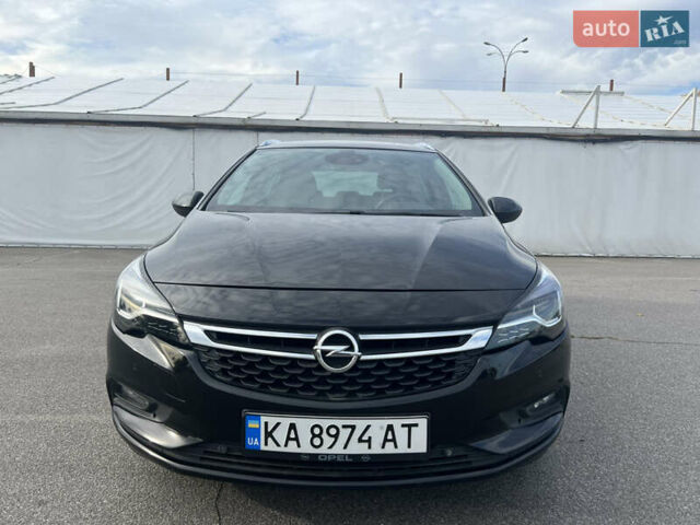 Черный Опель Астра, объемом двигателя 1.6 л и пробегом 224 тыс. км за 12000 $, фото 2 на Automoto.ua