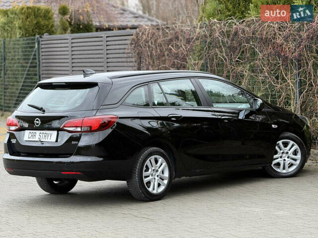 Чорний Опель Астра, об'ємом двигуна 1.6 л та пробігом 196 тис. км за 10999 $, фото 24 на Automoto.ua