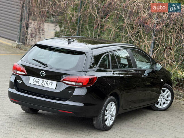 Чорний Опель Астра, об'ємом двигуна 1.6 л та пробігом 196 тис. км за 10999 $, фото 22 на Automoto.ua