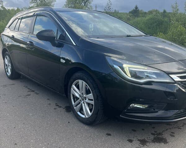 Черный Опель Астра, объемом двигателя 1.6 л и пробегом 242 тыс. км за 8400 $, фото 8 на Automoto.ua