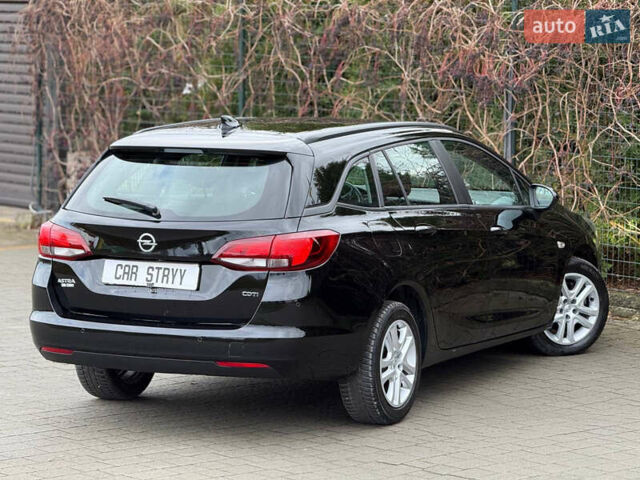Чорний Опель Астра, об'ємом двигуна 1.6 л та пробігом 196 тис. км за 10999 $, фото 3 на Automoto.ua