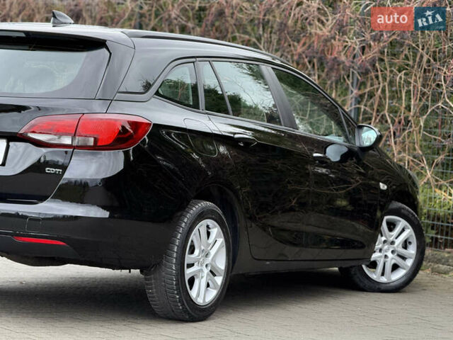 Чорний Опель Астра, об'ємом двигуна 1.6 л та пробігом 196 тис. км за 10999 $, фото 25 на Automoto.ua