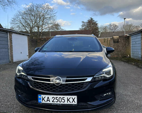 Черный Опель Астра, объемом двигателя 1.6 л и пробегом 142 тыс. км за 12000 $, фото 2 на Automoto.ua