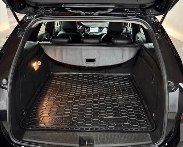 Черный Опель Астра, объемом двигателя 1.6 л и пробегом 195 тыс. км за 11990 $, фото 4 на Automoto.ua