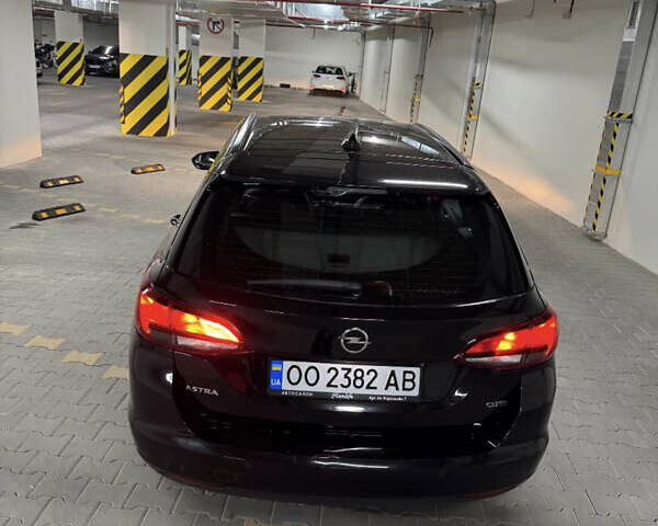 Черный Опель Астра, объемом двигателя 1.6 л и пробегом 195 тыс. км за 11990 $, фото 2 на Automoto.ua