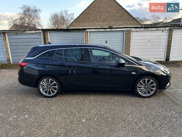 Черный Опель Астра, объемом двигателя 1.6 л и пробегом 142 тыс. км за 12000 $, фото 3 на Automoto.ua