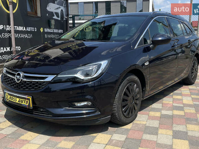 Черный Опель Астра, объемом двигателя 1.6 л и пробегом 176 тыс. км за 11200 $, фото 2 на Automoto.ua