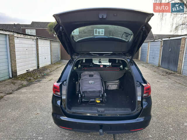 Черный Опель Астра, объемом двигателя 1.6 л и пробегом 142 тыс. км за 12000 $, фото 14 на Automoto.ua