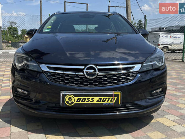 Черный Опель Астра, объемом двигателя 1.6 л и пробегом 176 тыс. км за 11200 $, фото 1 на Automoto.ua