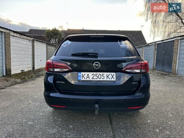 Черный Опель Астра, объемом двигателя 1.6 л и пробегом 142 тыс. км за 12000 $, фото 5 на Automoto.ua