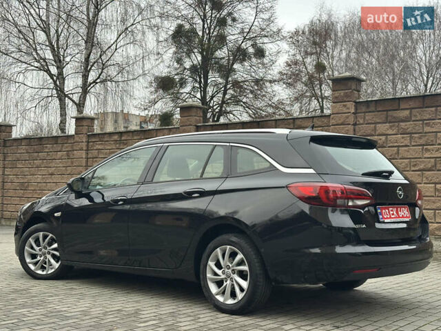 Черный Опель Астра, объемом двигателя 1.5 л и пробегом 260 тыс. км за 12800 $, фото 3 на Automoto.ua