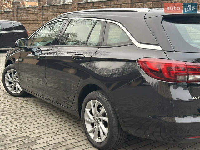 Черный Опель Астра, объемом двигателя 1.5 л и пробегом 260 тыс. км за 12800 $, фото 16 на Automoto.ua